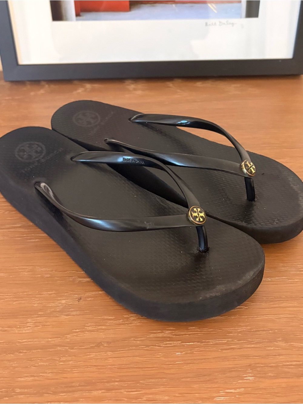Tory Burch Black Flip Flop Sandals with Gold Logo Accent